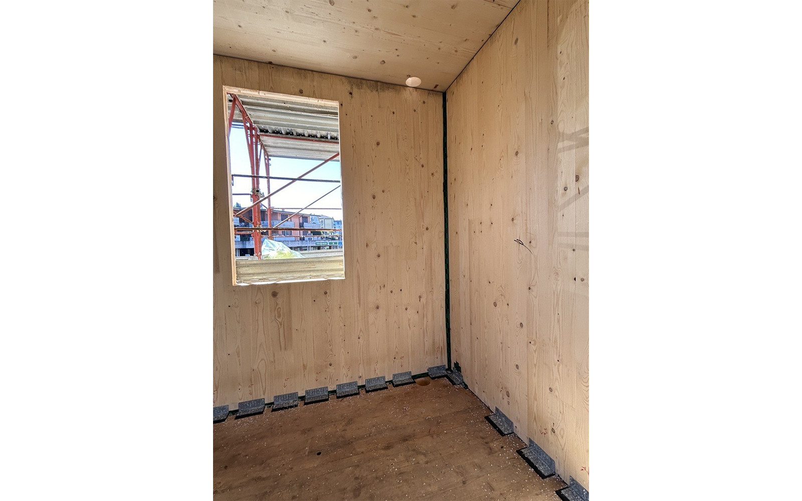 plates and soundproofing profiles between cross-laminated timber elements